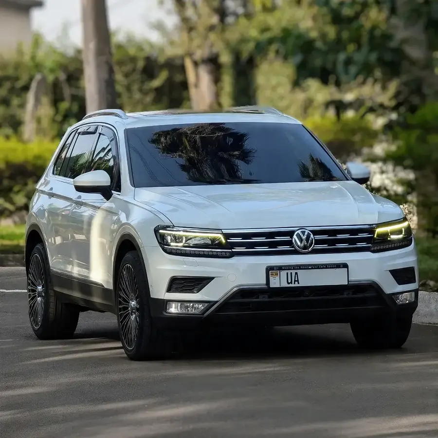 White Volkswagen Tiguan from the Right Rides fleet