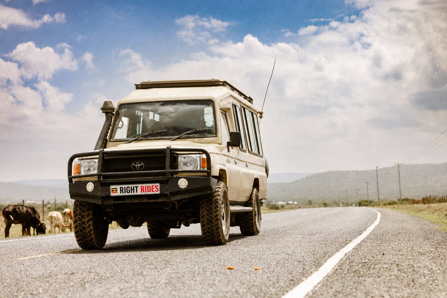 A safari Land Cruiser on the open road