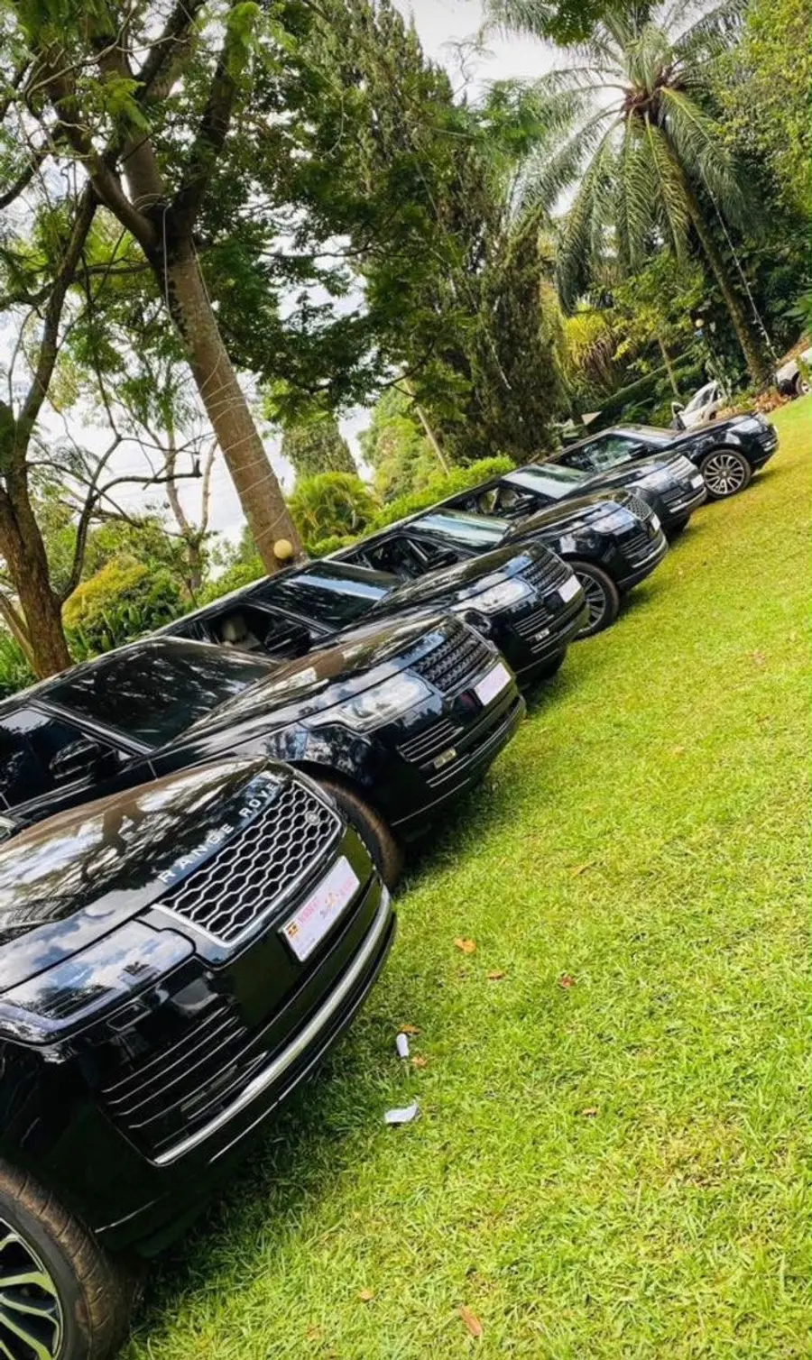 Black Range Rovers lined up for an event